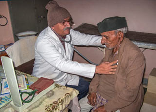 Doctor checking heartbeat of patient